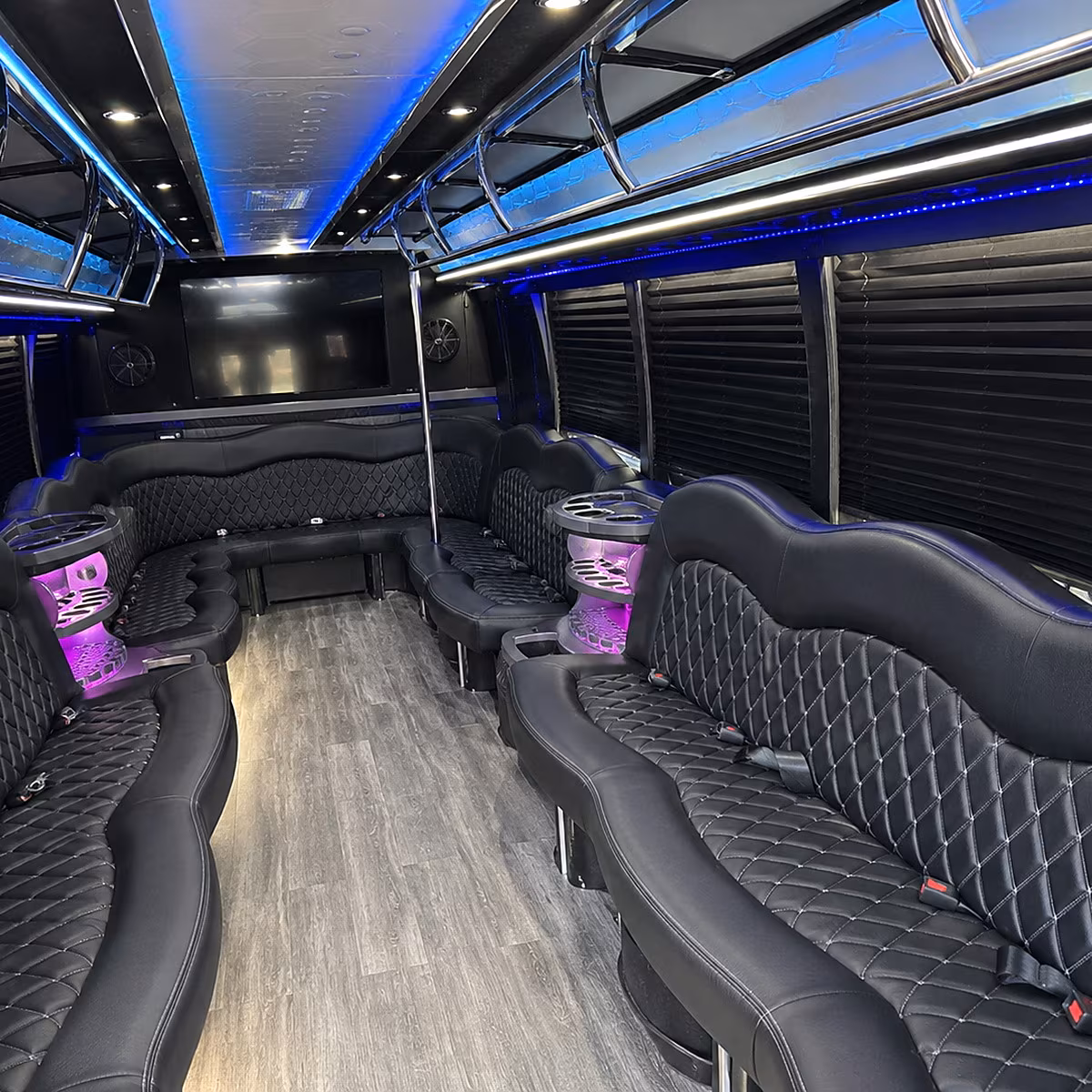 Friends laughing during a party bus celebration in Newport News